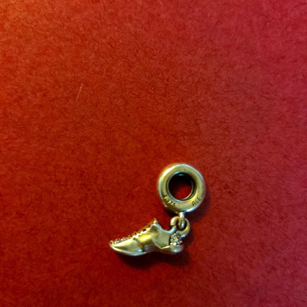 Retired! Running shield Pandora charm